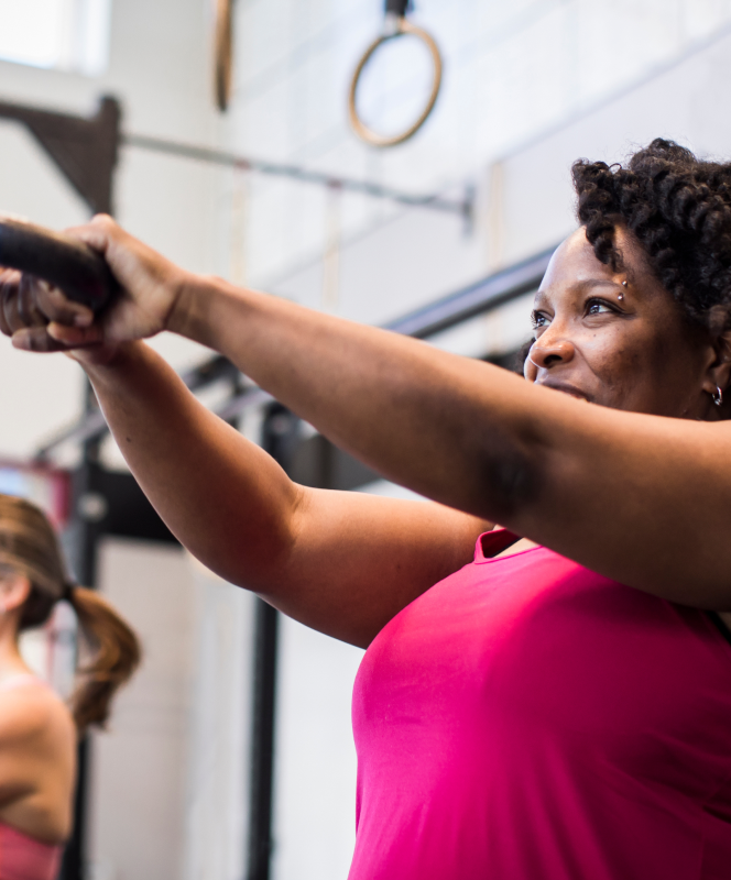 athlete exercising with kettlebell in the gym 2